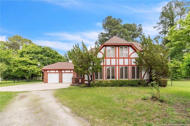 404AND408 Gleneagles Ct, Fayetteville, NC 28311 - tudor house featuring concrete driveway and an attached garage