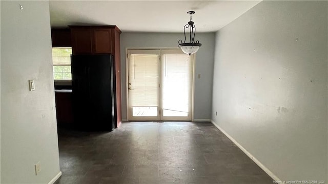 4313 Wellington Dr, Fayetteville, NC 28314 - unfurnished dining area featuring baseboards
