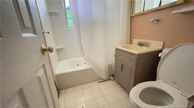 4313 Wellington Dr, Fayetteville, NC 28314 - bathroom featuring toilet, vanity, and shower / bath combination with curtain