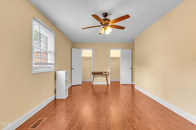 6423 New Market Way, Raleigh, NC 27615 - unfurnished room featuring ceiling fan, wood finished floors, and baseboards