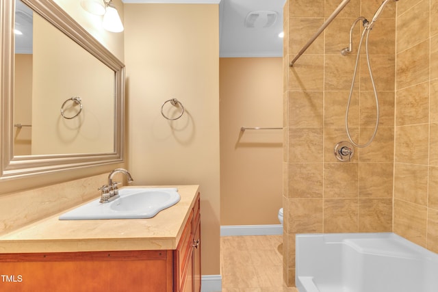 6423 New Market Way, Raleigh, NC 27615 - bathroom featuring vanity, toilet, crown molding, and baseboards
