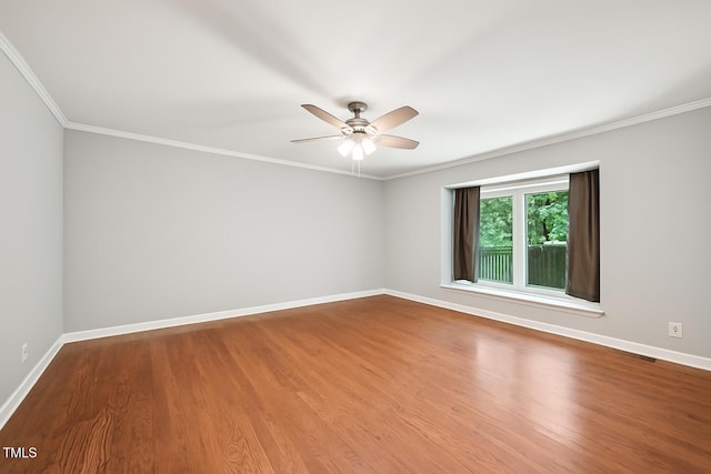 103 Lakeway Ct, Cary, NC 27511 - unfurnished room with baseboards, a ceiling fan, ornamental molding, and wood finished floors