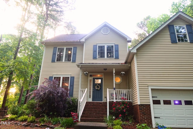 5917 Clearsprings Dr, Wake Forest, NC 27587 - traditional home with covered porch and a garage