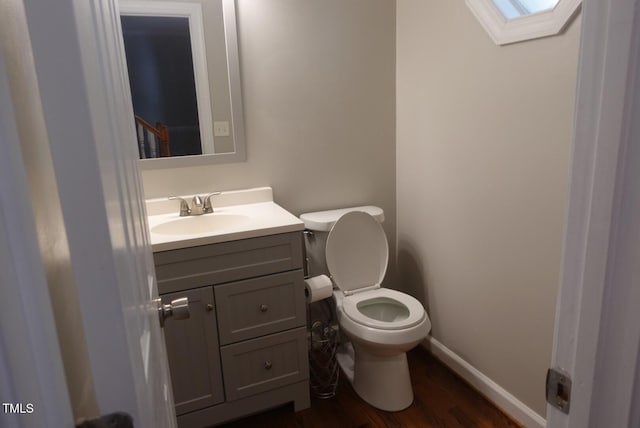 5917 Clearsprings Dr, Wake Forest, NC 27587 - bathroom featuring wood finished floors, vanity, toilet, and baseboards