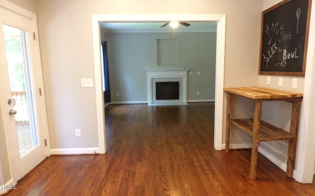 5917 Clearsprings Dr, Wake Forest, NC 27587 - unfurnished living room featuring baseboards, a fireplace, dark wood-style flooring, and a ceiling fan