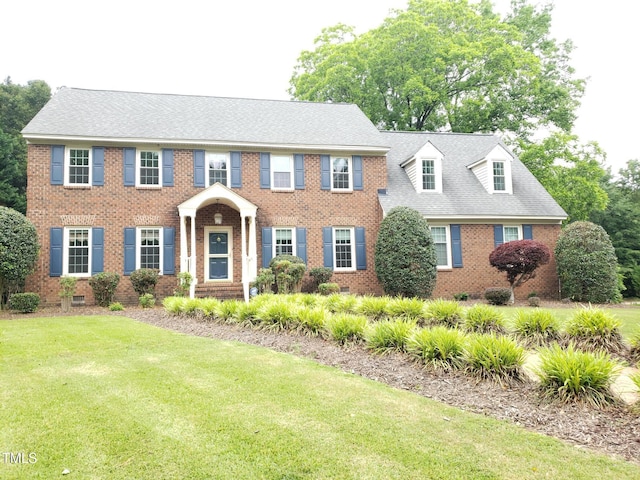 1711 Westbrook Dr NW, Wilson, NC 27896 - view of front of house featuring brick siding and a front lawn