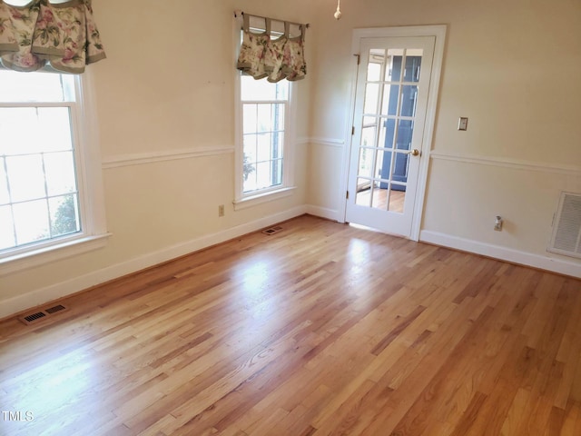 1711 Westbrook Dr NW, Wilson, NC 27896 - unfurnished dining area featuring baseboards and wood finished floors