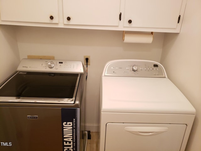 1711 Westbrook Dr NW, Wilson, NC 27896 - laundry room with washer and dryer and cabinet space