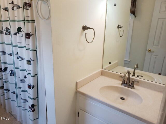 1711 Westbrook Dr NW, Wilson, NC 27896 - bathroom featuring vanity and a shower with shower curtain