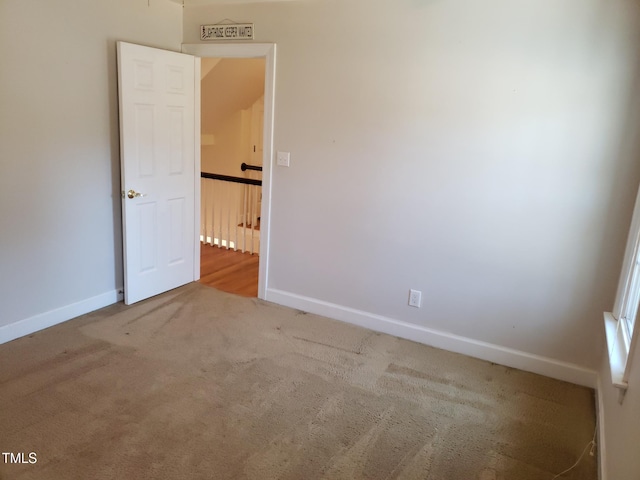 1711 Westbrook Dr NW, Wilson, NC 27896 - spare room with carpet and baseboards