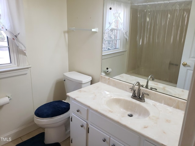 1711 Westbrook Dr NW, Wilson, NC 27896 - full bathroom with toilet, vanity, tile patterned floors, and shower / bathtub combination with curtain