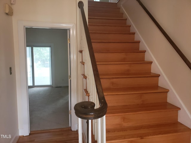 1711 Westbrook Dr NW, Wilson, NC 27896 - stairway featuring wood finished floors and baseboards