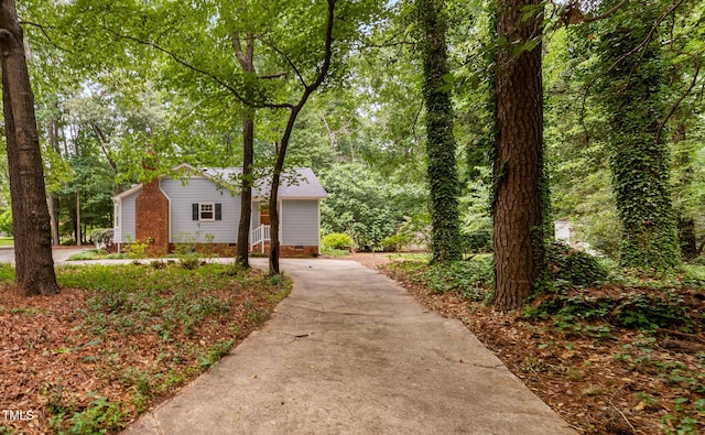 4004 Bamburgh Ln, Apex, NC 27539 - view of side of home featuring driveway and crawl space