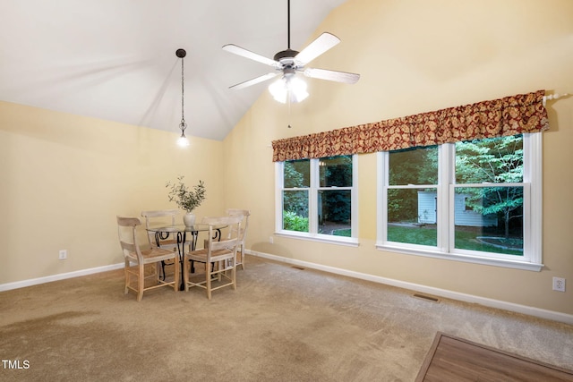 4004 Bamburgh Ln, Apex, NC 27539 - dining space with carpet flooring, a ceiling fan, baseboards, and high vaulted ceiling