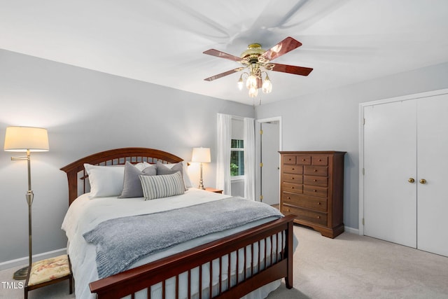 4004 Bamburgh Ln, Apex, NC 27539 - bedroom with light colored carpet, a closet, a ceiling fan, and baseboards