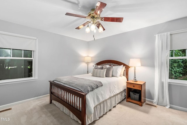 4004 Bamburgh Ln, Apex, NC 27539 - bedroom featuring light colored carpet, baseboards, and a ceiling fan