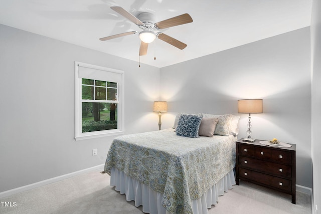 4004 Bamburgh Ln, Apex, NC 27539 - bedroom featuring light carpet, baseboards, and a ceiling fan
