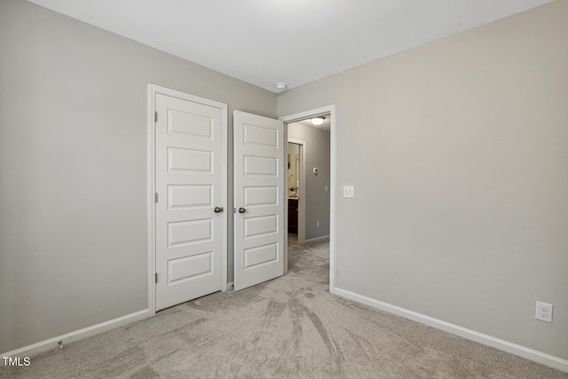 810 Richmont Grove Ln, Apex, NC 27523 - unfurnished bedroom with baseboards and light colored carpet