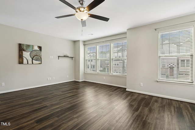 810 Richmont Grove Ln, Apex, NC 27523 - spare room with plenty of natural light, dark wood-style flooring, and a ceiling fan