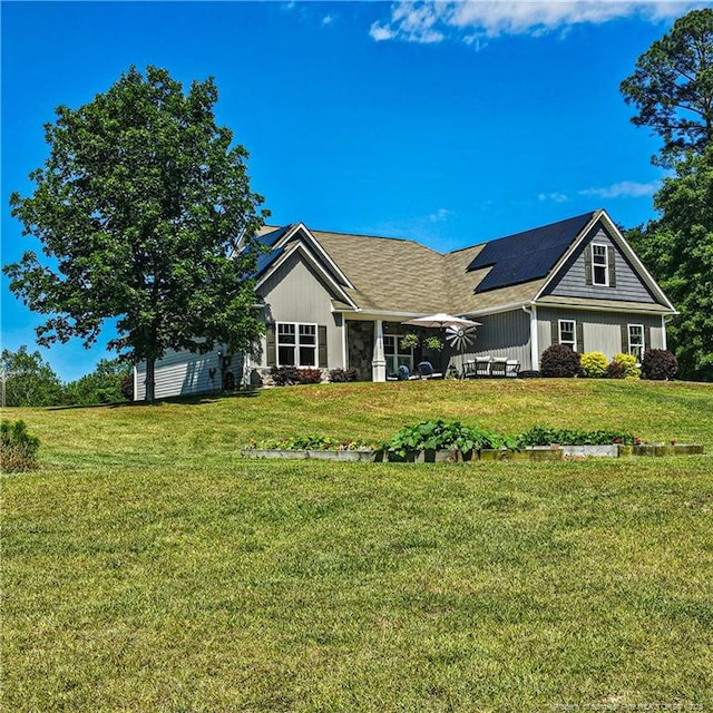 1303 Palestine Rd, Linden, NC 28356 - view of front of property with solar panels and a front lawn