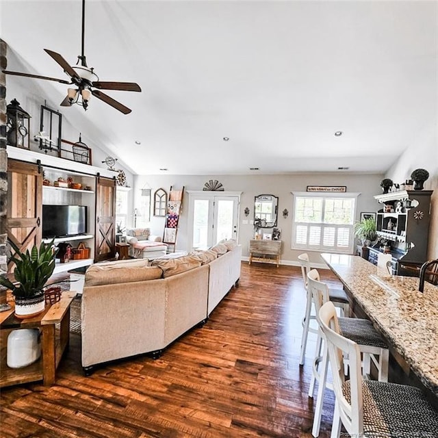 1303 Palestine Rd, Linden, NC 28356 - living area featuring a ceiling fan, dark wood finished floors, lofted ceiling, and baseboards