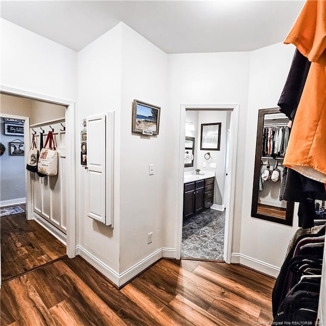 1303 Palestine Rd, Linden, NC 28356 - hall featuring dark wood-style flooring and baseboards