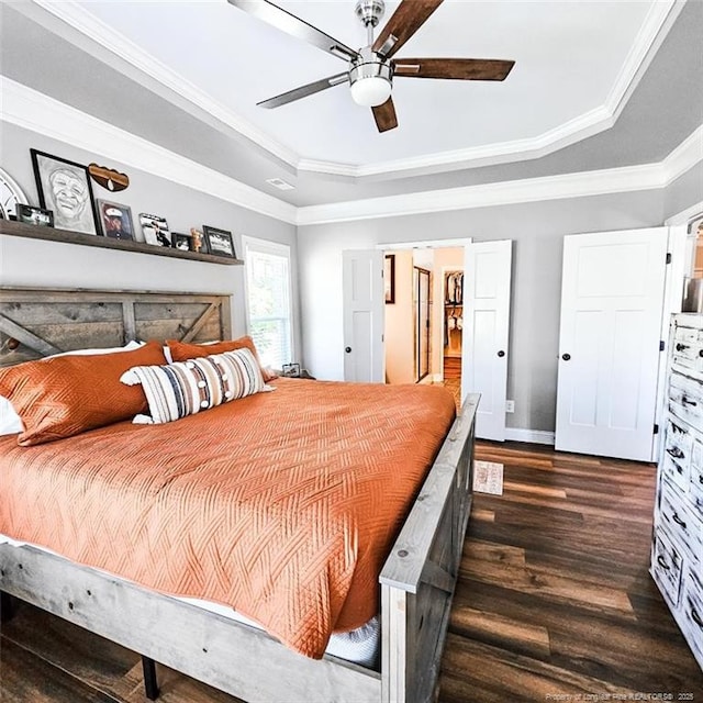 1303 Palestine Rd, Linden, NC 28356 - bedroom with a tray ceiling, wood finished floors, crown molding, baseboards, and a ceiling fan
