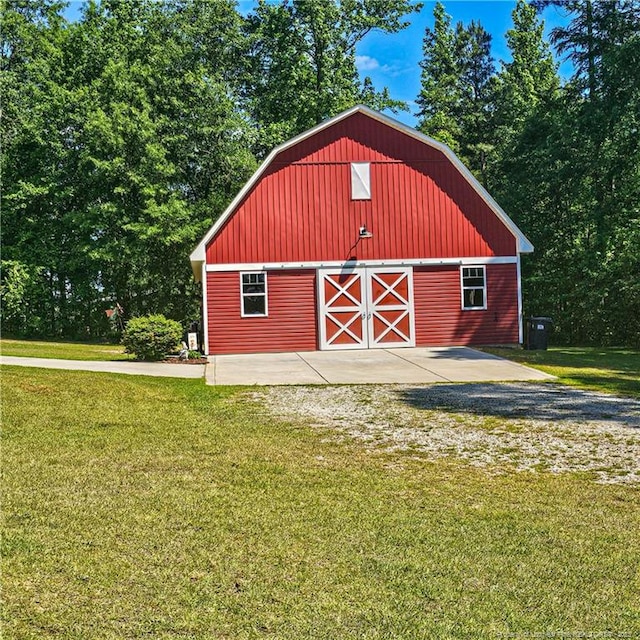 1303 Palestine Rd, Linden, NC 28356 - view of barn with a lawn and view of wooded area