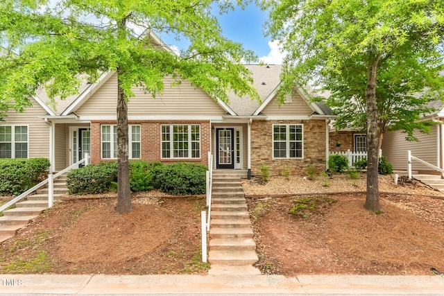 11220 Avocet Ln Unit 104, Raleigh, NC 27617 - view of front of house with stairway