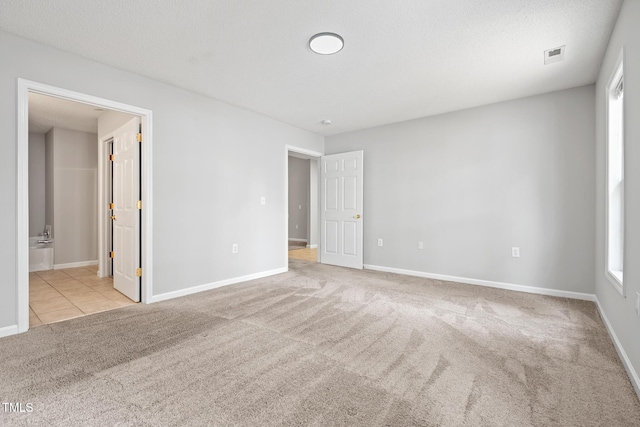 11220 Avocet Ln Unit 104, Raleigh, NC 27617 - carpeted spare room with baseboards