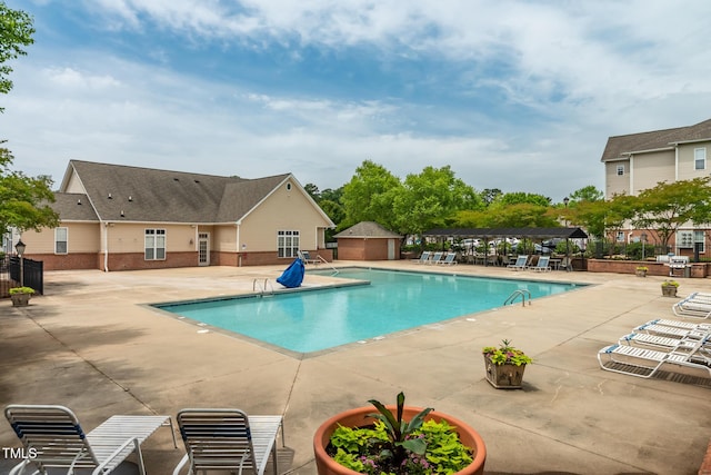 11220 Avocet Ln Unit 104, Raleigh, NC 27617 - community pool featuring a patio area