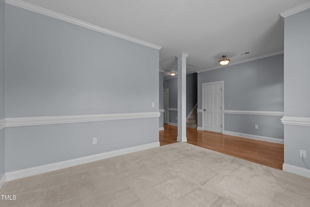 39 Mcguire Ln, Clayton, NC 27527 - carpeted spare room with crown molding, ornate columns, and baseboards
