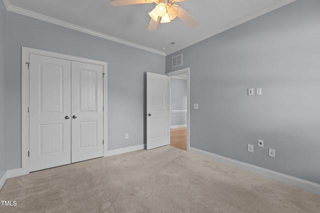 39 Mcguire Ln, Clayton, NC 27527 - unfurnished bedroom featuring ornamental molding, carpet, baseboards, a closet, and a ceiling fan