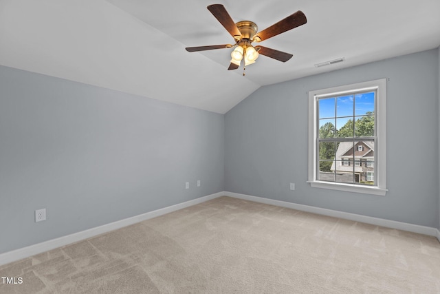 39 Mcguire Ln, Clayton, NC 27527 - bonus room with lofted ceiling, light carpet, baseboards, and ceiling fan