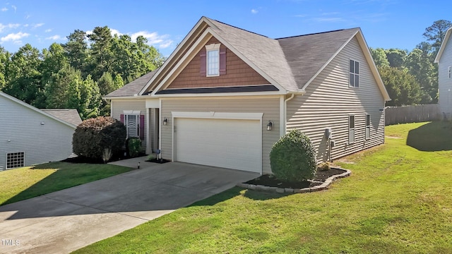 39 Mcguire Ln, Clayton, NC 27527 - view of front of property with a front yard, driveway, a garage, and a shingled roof