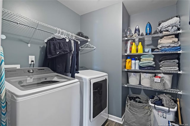 1324 Homeland Dr, Parkton, NC 28371 - clothes washing area featuring independent washer and dryer and wood finished floors