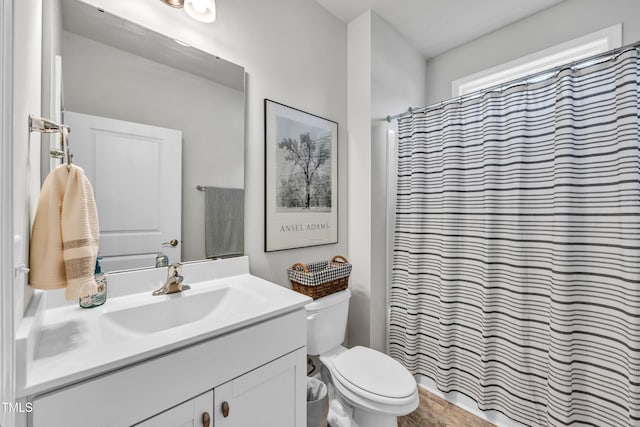 1096 Aberlour Ln, Burlington, NC 27215 - full bathroom featuring vanity, toilet, and curtained shower