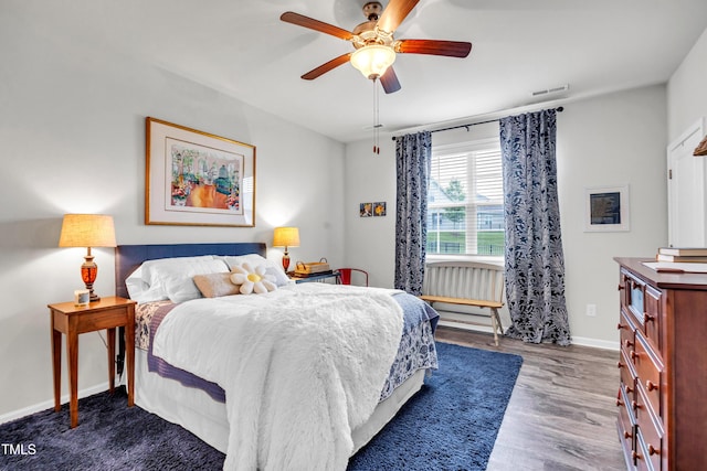 1096 Aberlour Ln, Burlington, NC 27215 - bedroom with dark wood-style floors, baseboards, and a ceiling fan