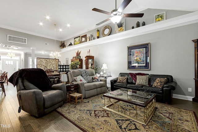 living room with a chandelier, decorative columns, ceiling fan, crown molding, and wood finished floors