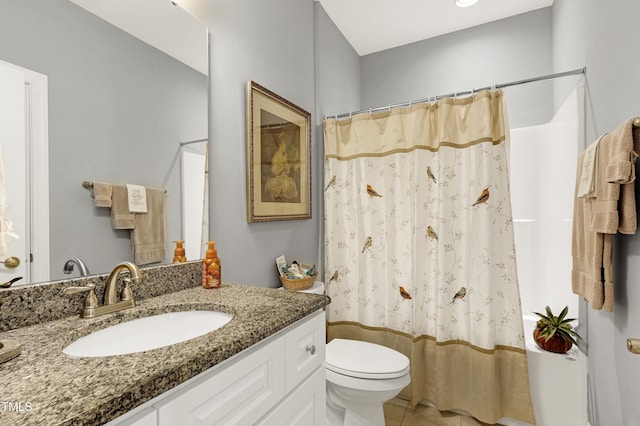 bathroom featuring toilet, tile patterned flooring, vanity, and a shower with shower curtain