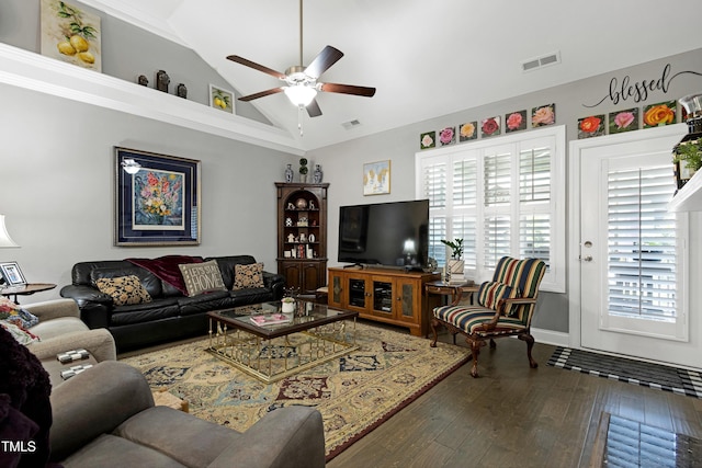 living area with ceiling fan, wood finished floors, and high vaulted ceiling
