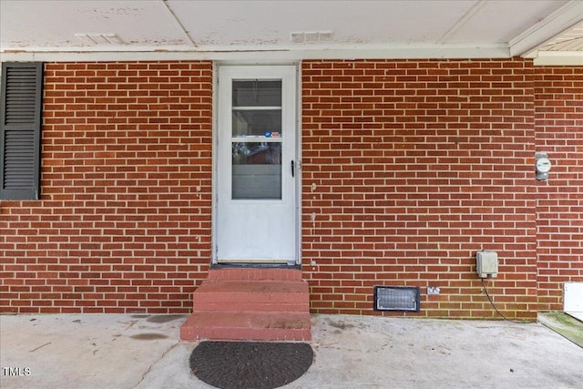 5345 Lamm Rd, Wilson, NC 27893 - view of exterior entry featuring crawl space and a patio area