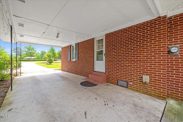 5345 Lamm Rd, Wilson, NC 27893 - view of patio / terrace featuring entry steps and an attached carport