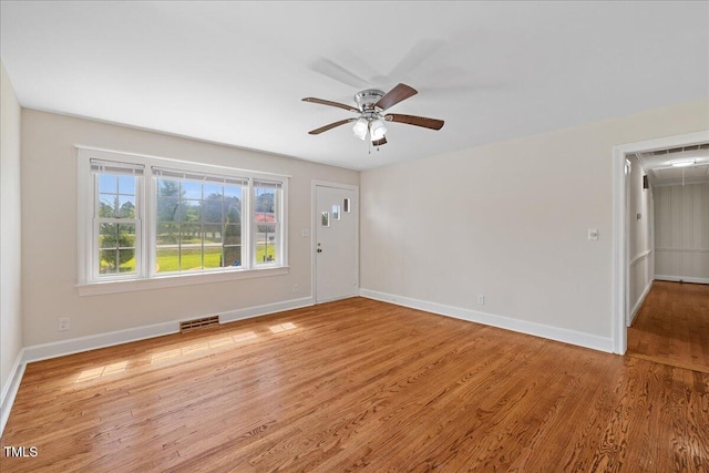 5345 Lamm Rd, Wilson, NC 27893 - empty room with baseboards, a ceiling fan, and light wood finished floors
