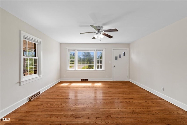 5345 Lamm Rd, Wilson, NC 27893 - entrance foyer with baseboards, ceiling fan, and wood finished floors