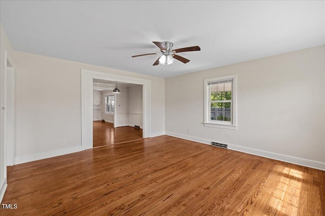 5345 Lamm Rd, Wilson, NC 27893 - spare room with ceiling fan, wood finished floors, and baseboards