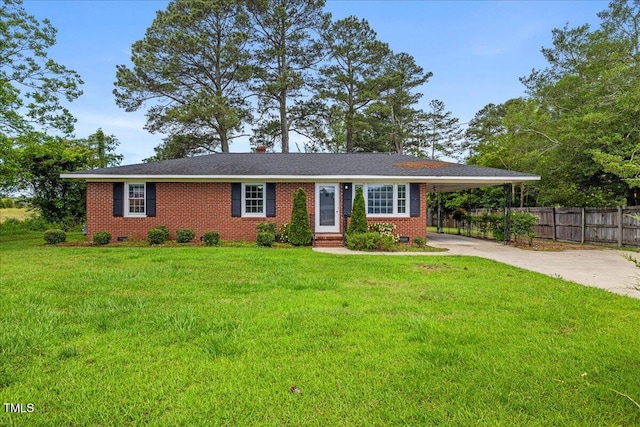 5345 Lamm Rd, Wilson, NC 27893 - single story home with concrete driveway, a carport, crawl space, brick siding, and entry steps