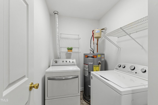 8610 Neuse Landing Ln Unit 103, Raleigh, NC 27616 - washroom featuring washing machine and clothes dryer and water heater