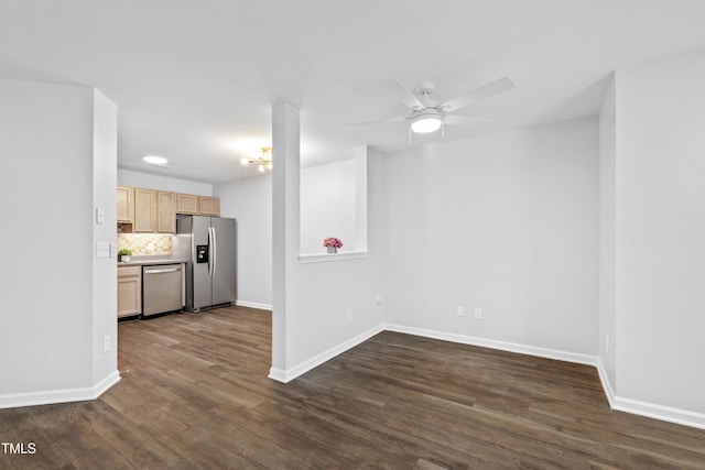 8610 Neuse Landing Ln Unit 103, Raleigh, NC 27616 - unfurnished living room featuring dark wood-style flooring, baseboards, and ceiling fan