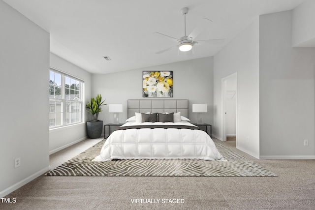 8610 Neuse Landing Ln Unit 103, Raleigh, NC 27616 - bedroom featuring lofted ceiling, carpet floors, and baseboards